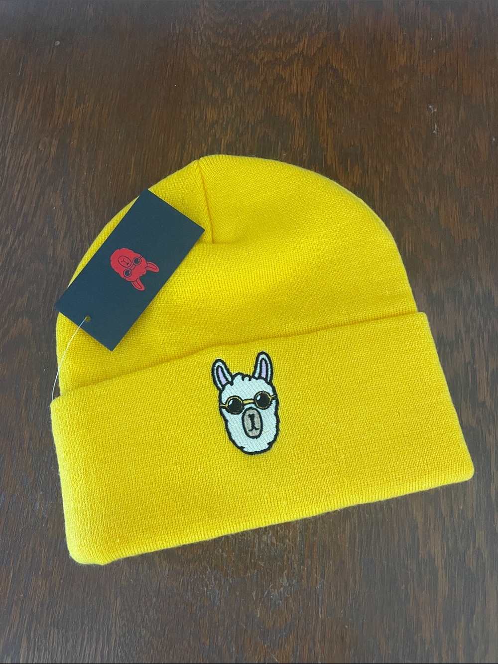 Golden yellow beanie new with llama design